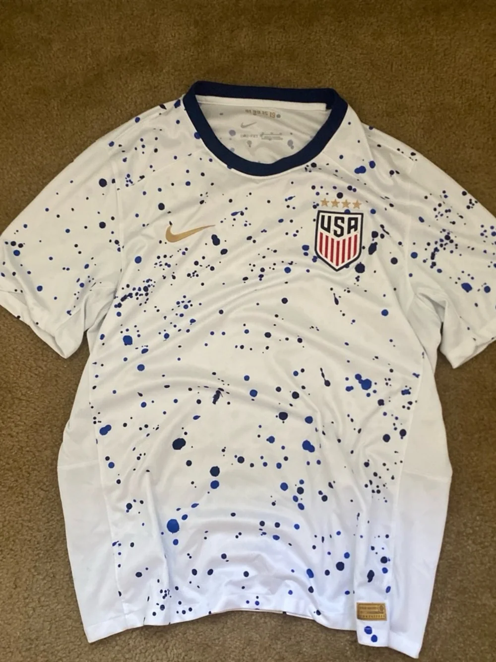 Nike  USA White Jersey with Blue Splatter and Gold Swoosh